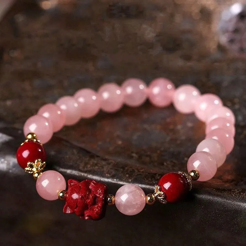 Women's aquamarine crystal bracelet with pink and blue dopamine colours, round geometric beads, handcrafted mixed materials