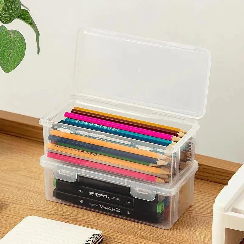 Transparent PP plastic stationery storage box with pencils and art supplies visible inside
