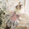 A pink, blue, or green tartan skirt for small dogs or cats in a princess costume style.
