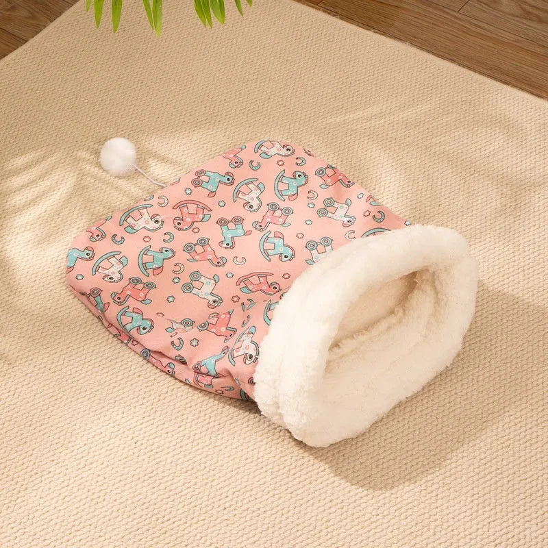 Blue rabbit print flannel cat sleeping bag nest measuring 50 by 40 centimetres.