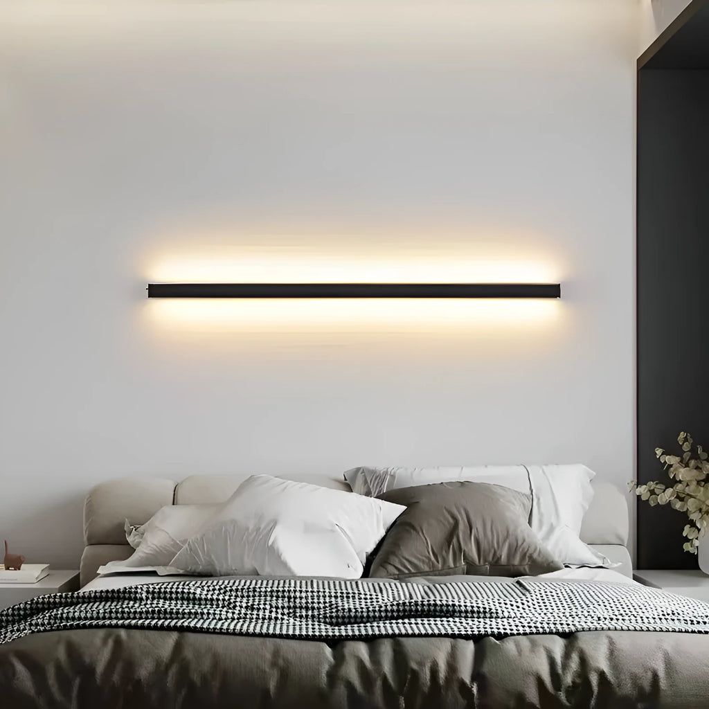 A sleek, black 80cm long strip LED wall lamp with a PC shade and touch control for three light colours.