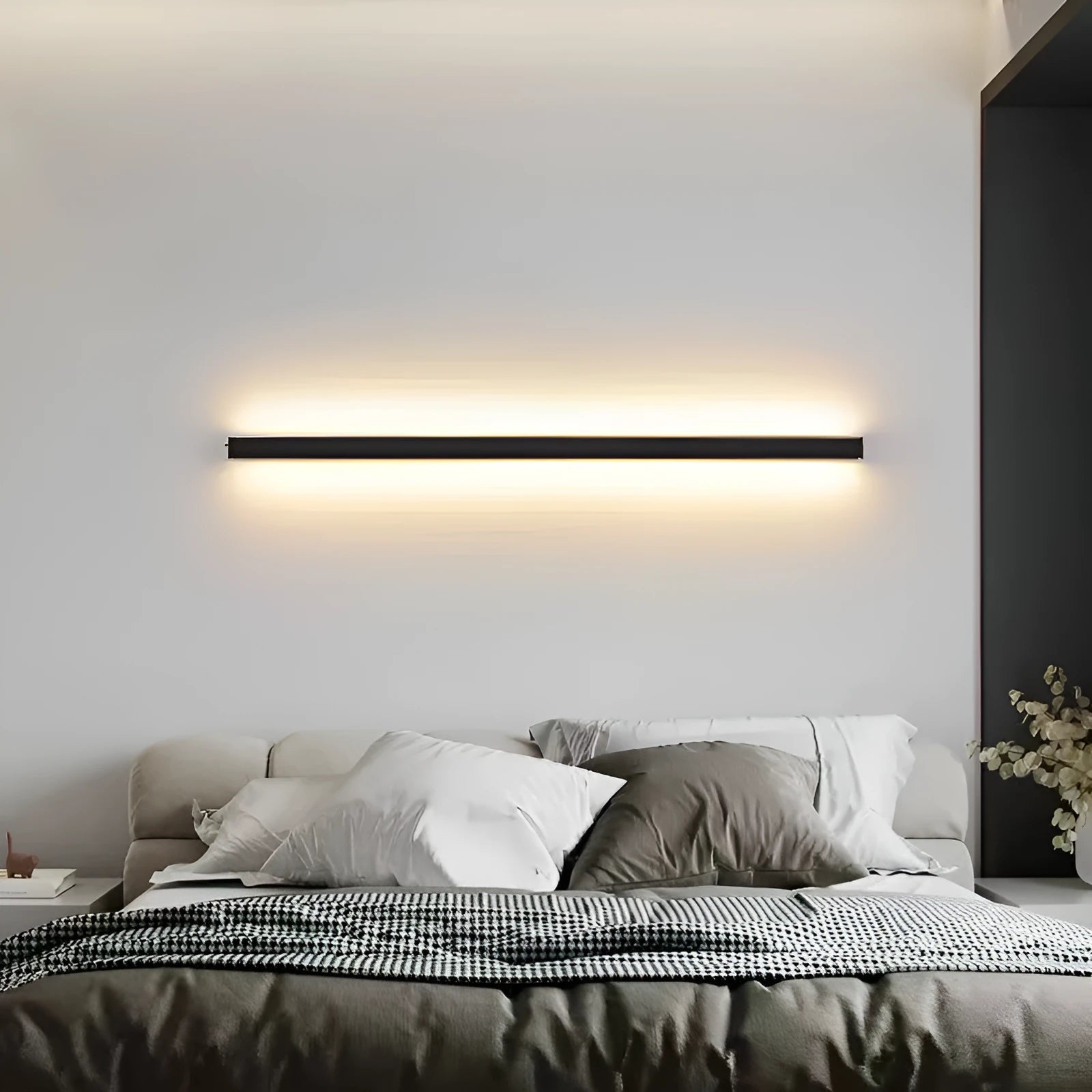 A sleek, black 80cm long strip LED wall lamp with a PC shade and touch control for three light colours.