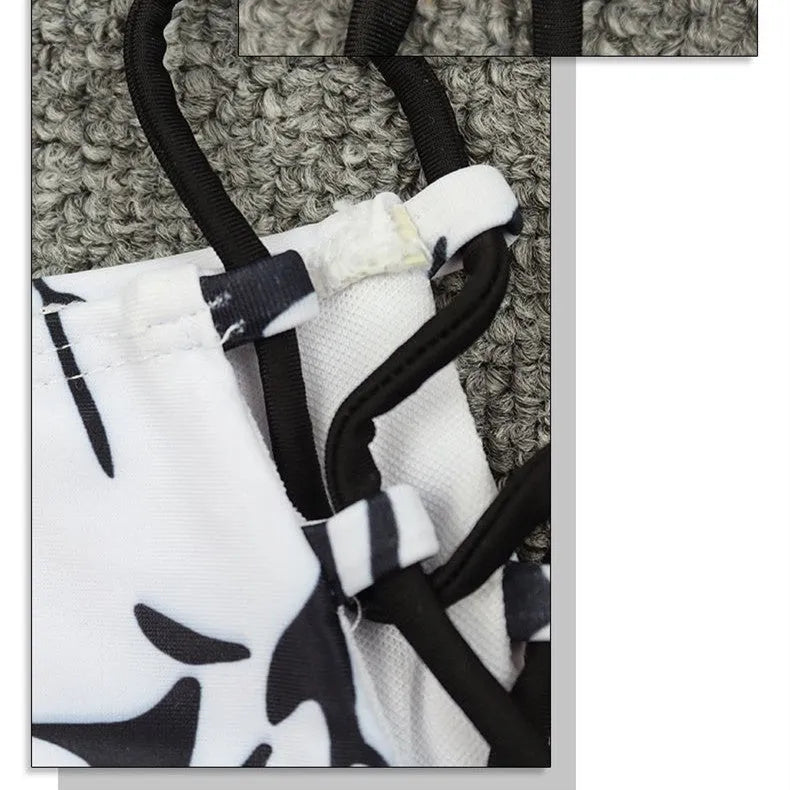 Black and white tie dye two-piece bikini set with chest pad and tied details on the top