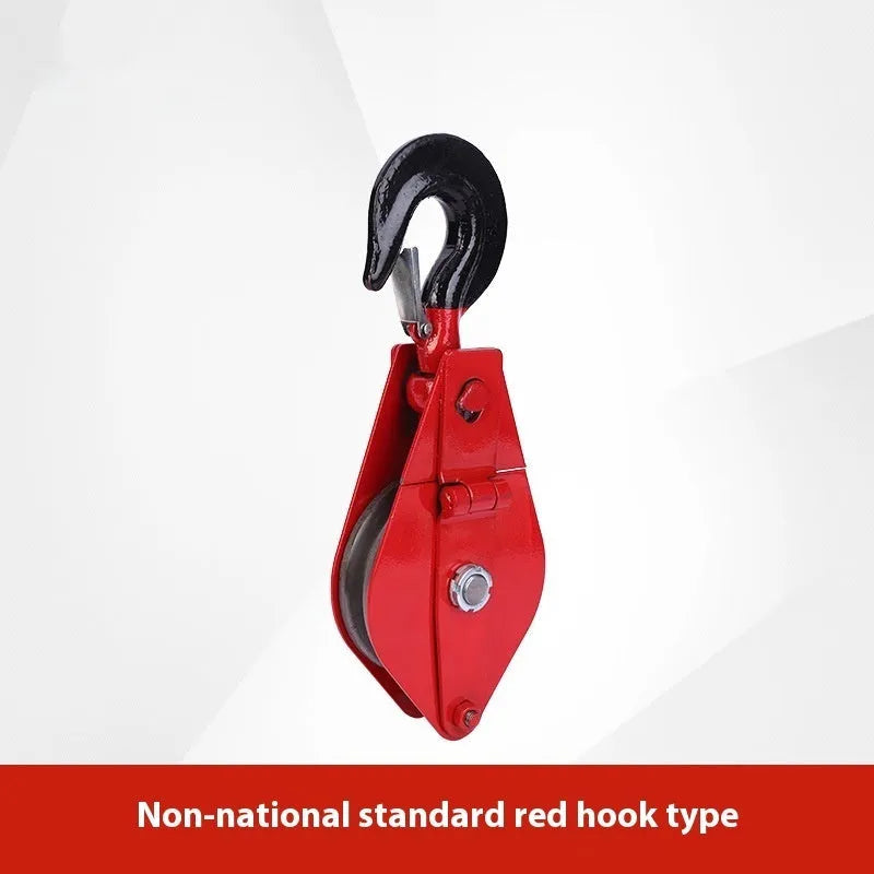 Red industrial lifting pulley with a forged steel safety hook and single wire rope wheel.