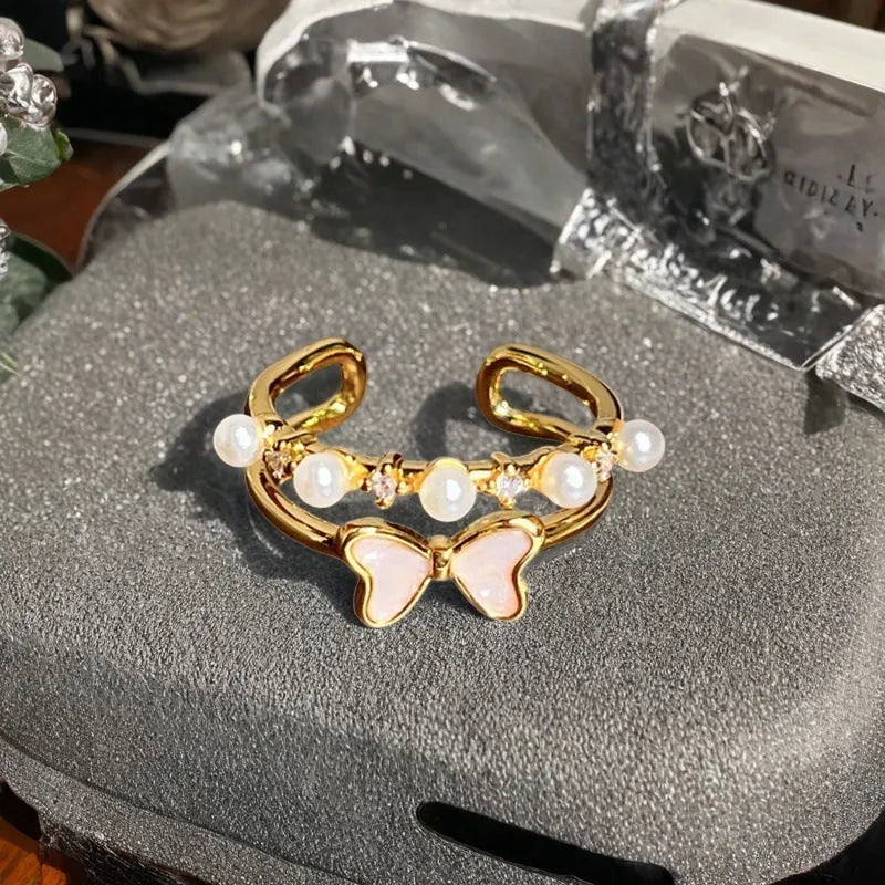 Adjustable copper ring with vintage oil dripping gourd design, zircon inlay, and floral bow shapes in New Chinese style.