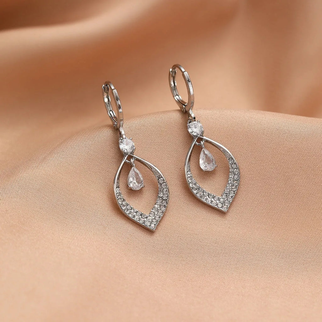 Gold and silver zircon teardrop tassel drop earrings on a copper base.