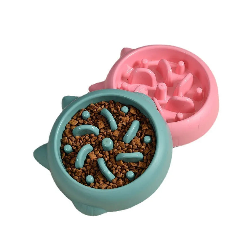 Green pet slow feeder bowl with bone-shaped ridges inside to slow down eating