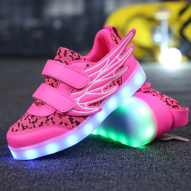 Children's plum red and white LED light up sneakers with USB charging port visible