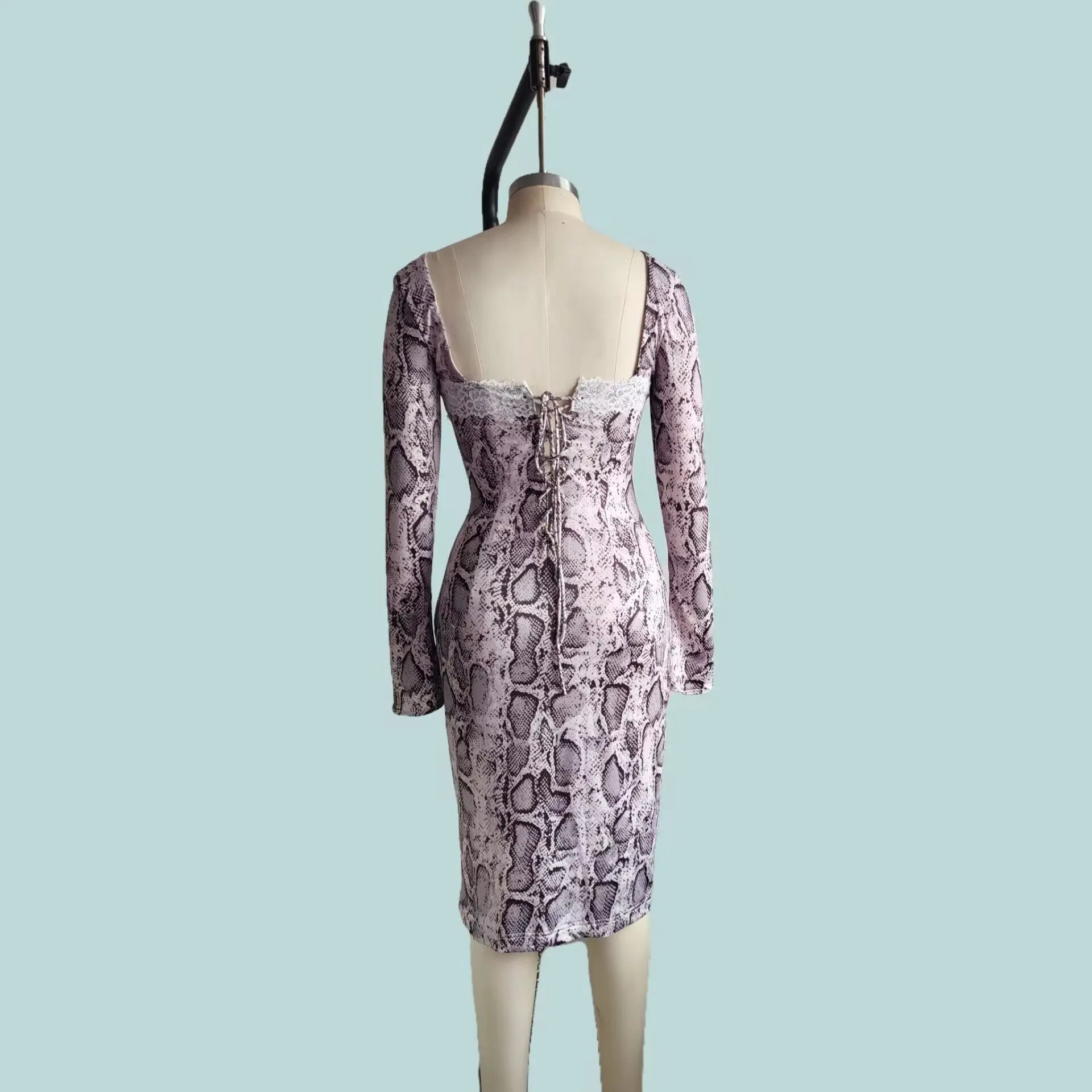Grey slim fit long sleeve lace dress with a digital printed 3D pattern and A-line skirt.