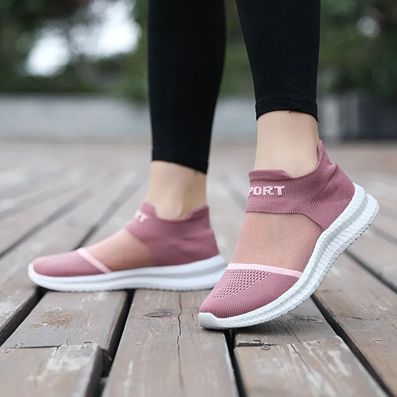 Flyknit casual sock shoes in khaki colour with lace-up front and tassel detail on a flat MD sole.