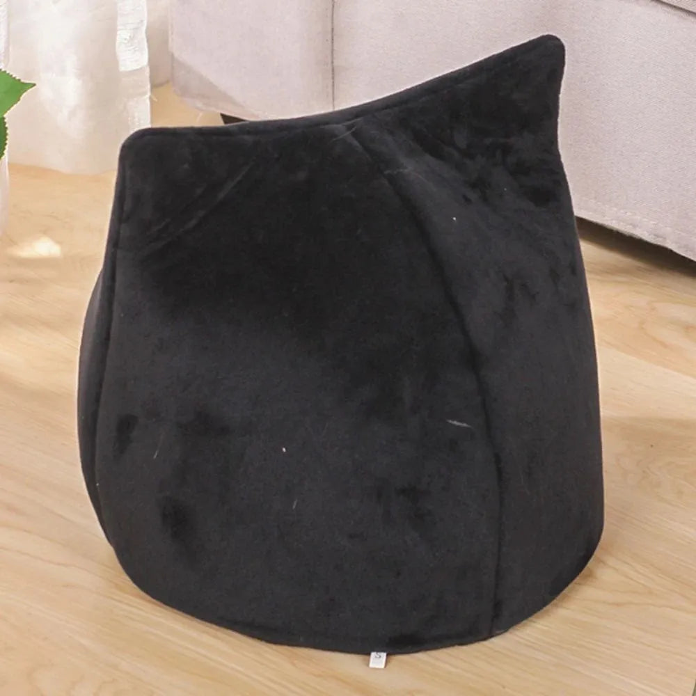 Soft warm cat bed in cat shape design with anti-slip bottom, machine washable, available in S and L sizes.