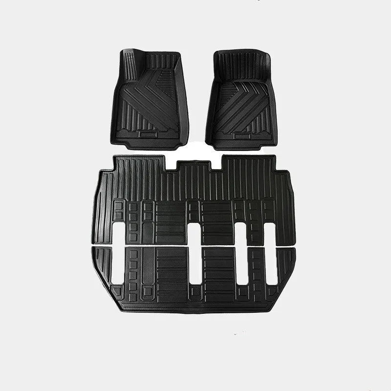 Tesla Model X waterproof TPE rubber floor mats showing left and right rudder design for vehicle-specific fitment