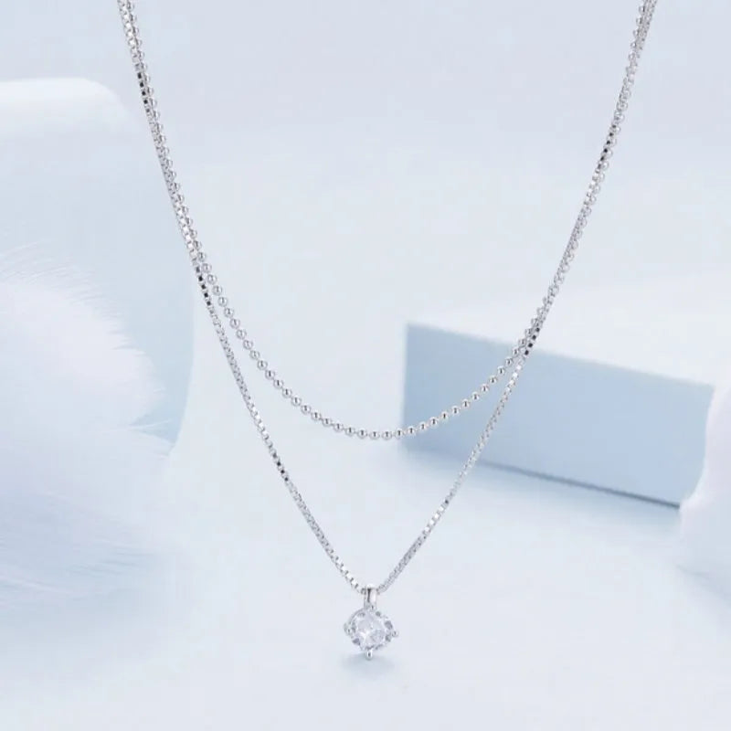S925 sterling silver double-layer necklace with pearl chain design in silver finish