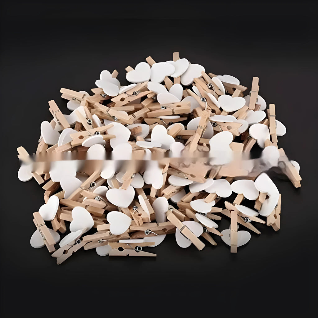Five handmade solid wood heart-shaped hair clips in red, white, pink, yellow, and rose colours
