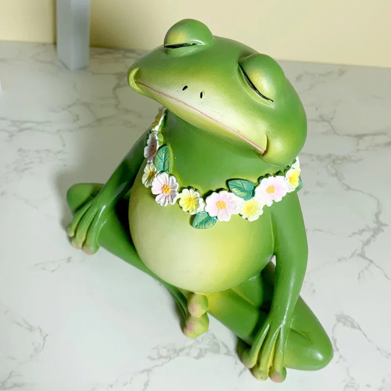 Magic yoga frog figurine in RDW123 colour on a tabletop.