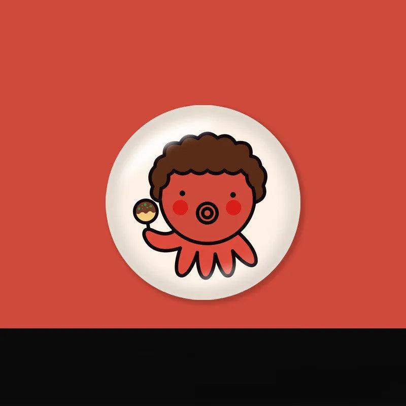 Creative telescopic glue cartoon phone airbag bracket in colour C1 girl design on a desk holding a smartphone