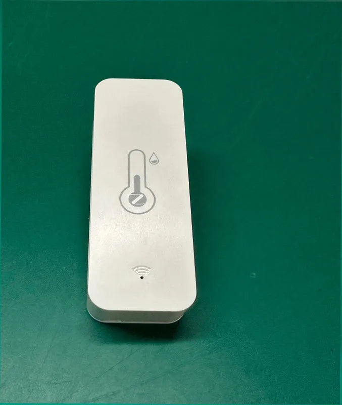 White WiFi and Zigbee temperature humidity sensor with ABS plastic housing showing measurement display