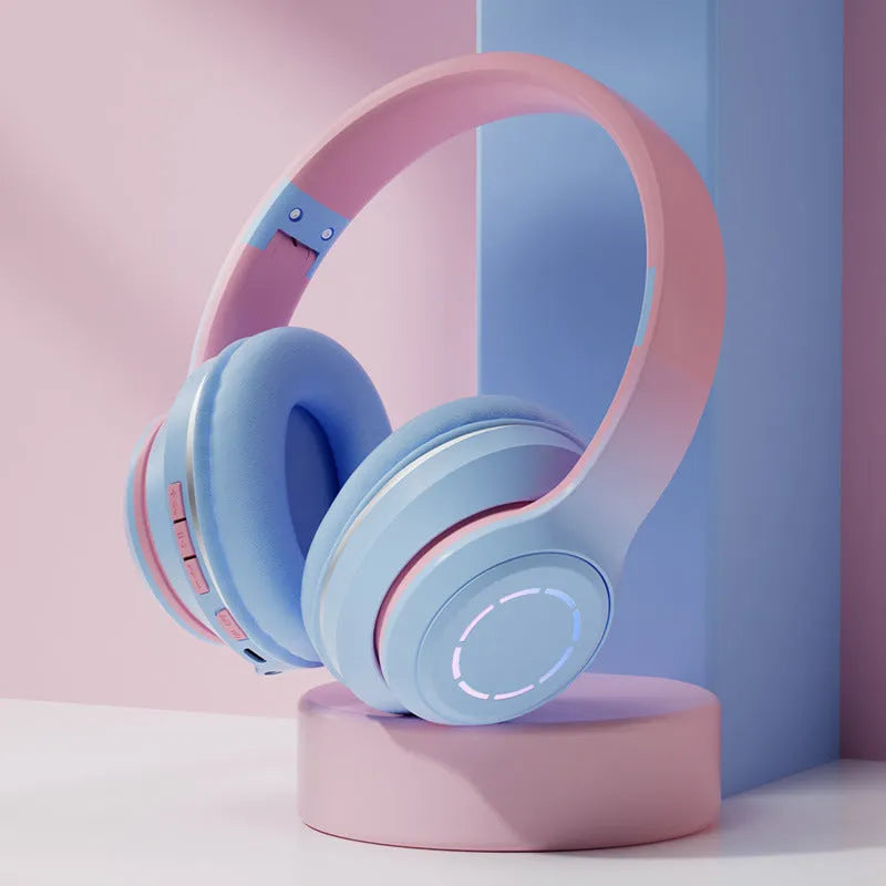 Gradient foldable wireless Bluetooth headset in blue with ear cushions and padded headband