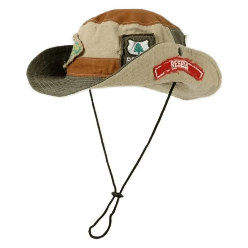 Army green cotton foldable fisherman hat with flat top crown and hand-painted punk details