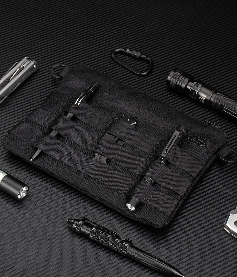 Black tactical waist pack made from Oxford cloth measuring 18cm by 3.5cm