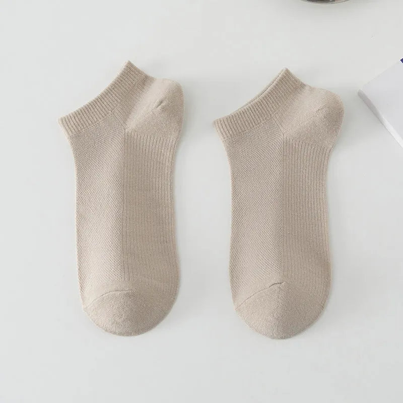 Solid colour low-cut boat socks for men made from polyester, shown in one of six available colours.