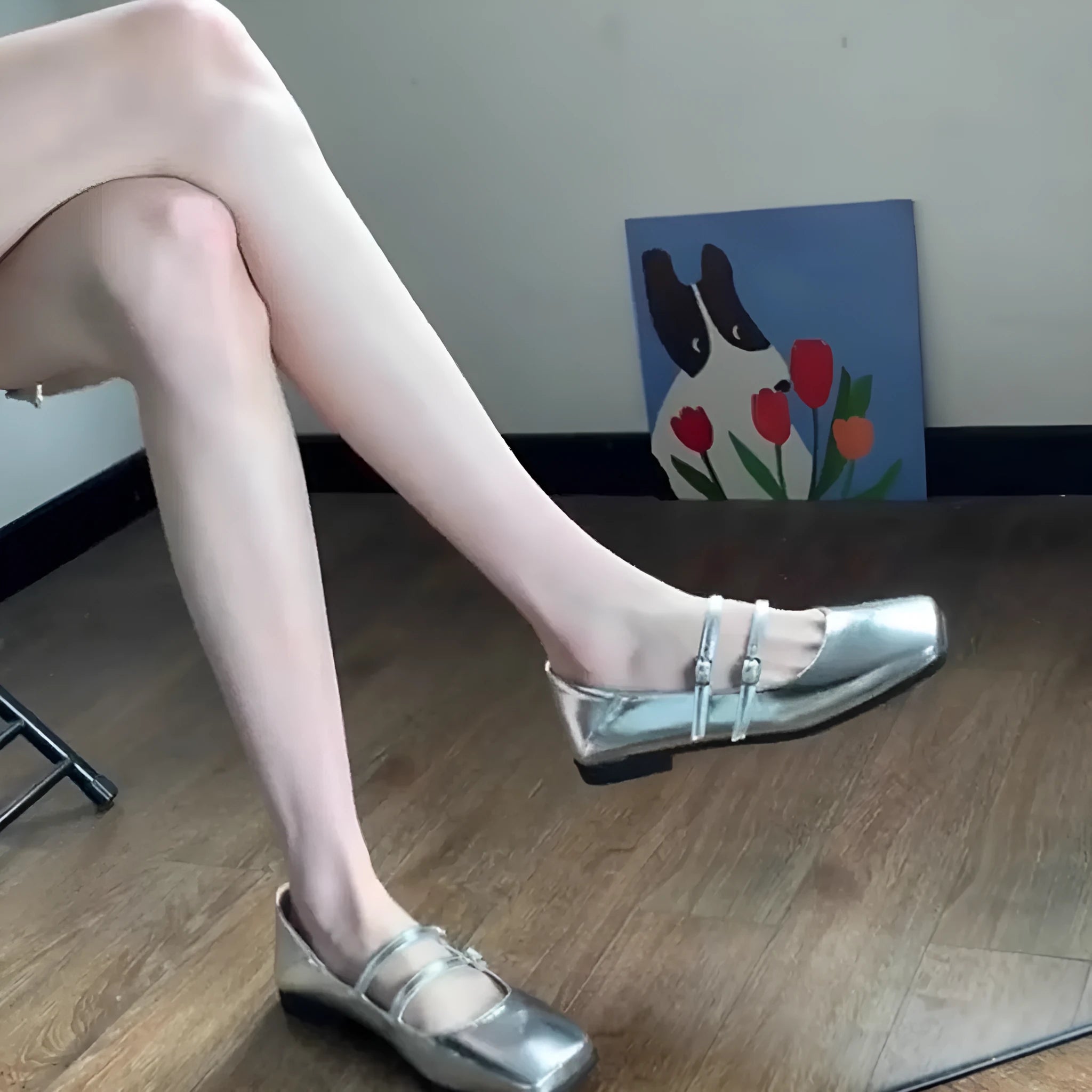 Women's silver genuine leather Mary Jane shoes with a cross buckle strap and low flat heel.