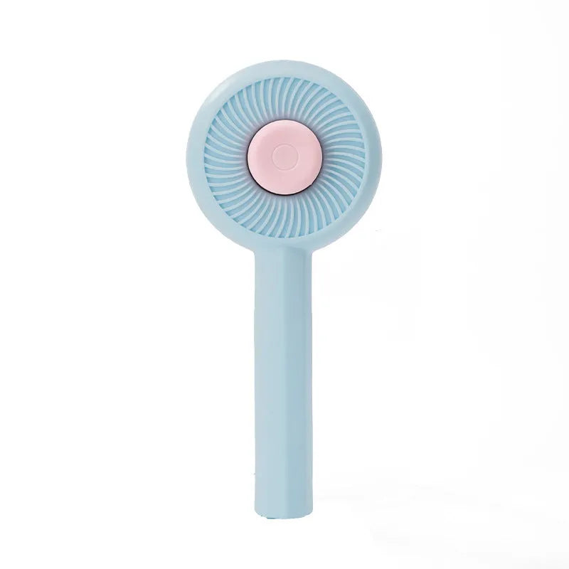 Blue and yellow pet grooming brush with self-cleaning button and angled wire needles