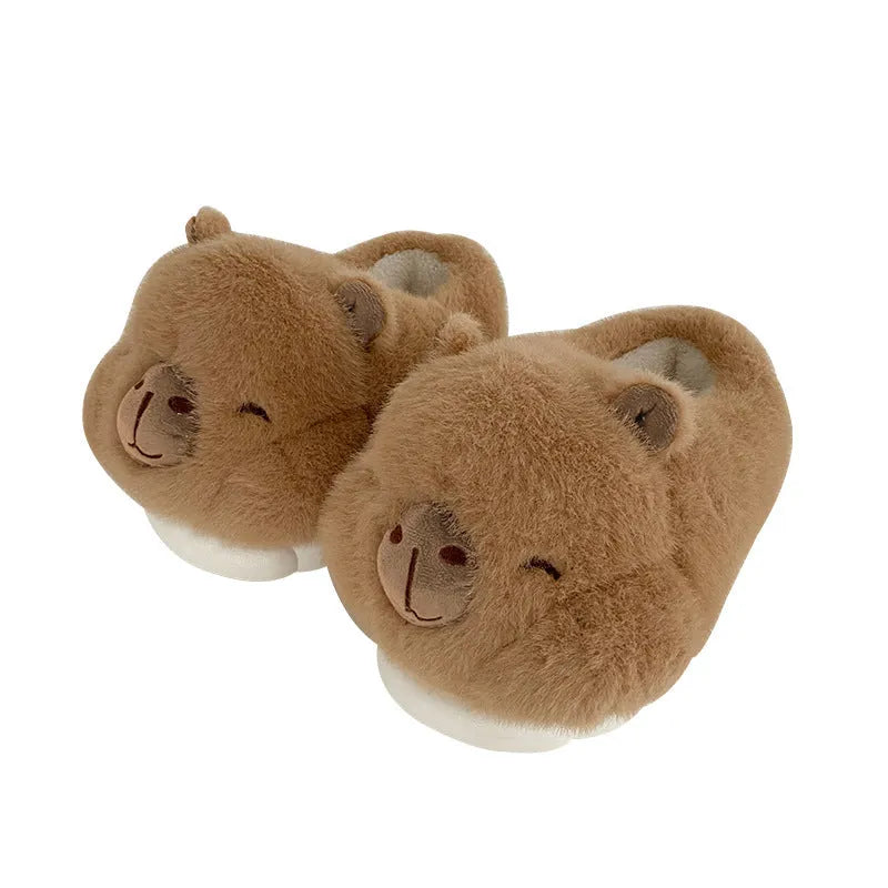 Light brown women's winter slippers with plush upper, artificial wool lining, and PVC sewn soles
