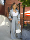 Grey and black striped sweater two-piece set with zipper detail on the top