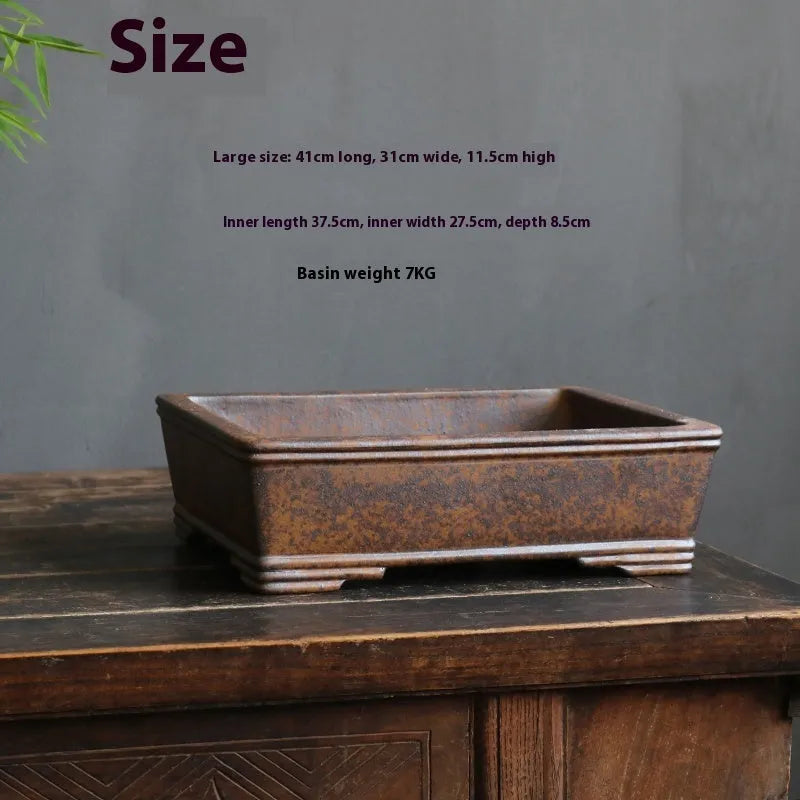 Purple sand rectangular bonsai basin shown in two sizes for floor-standing plant display.