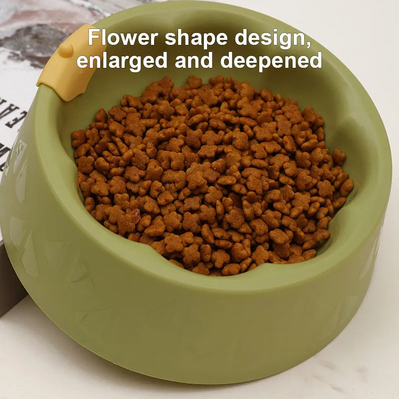 Green plastic double pet bowl feeder for dogs and cats on a white background