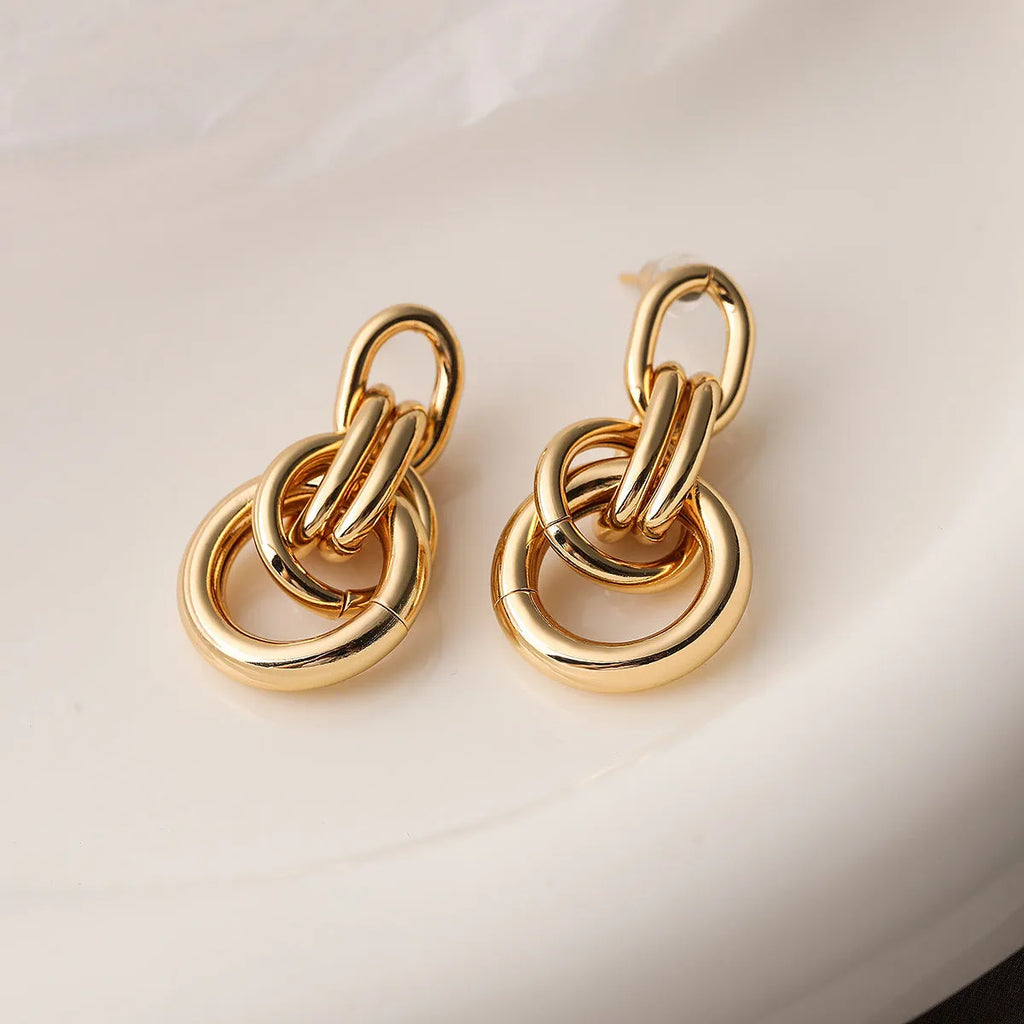 Gold geometric irregular shaped copper earrings for women, INS style statement jewellery