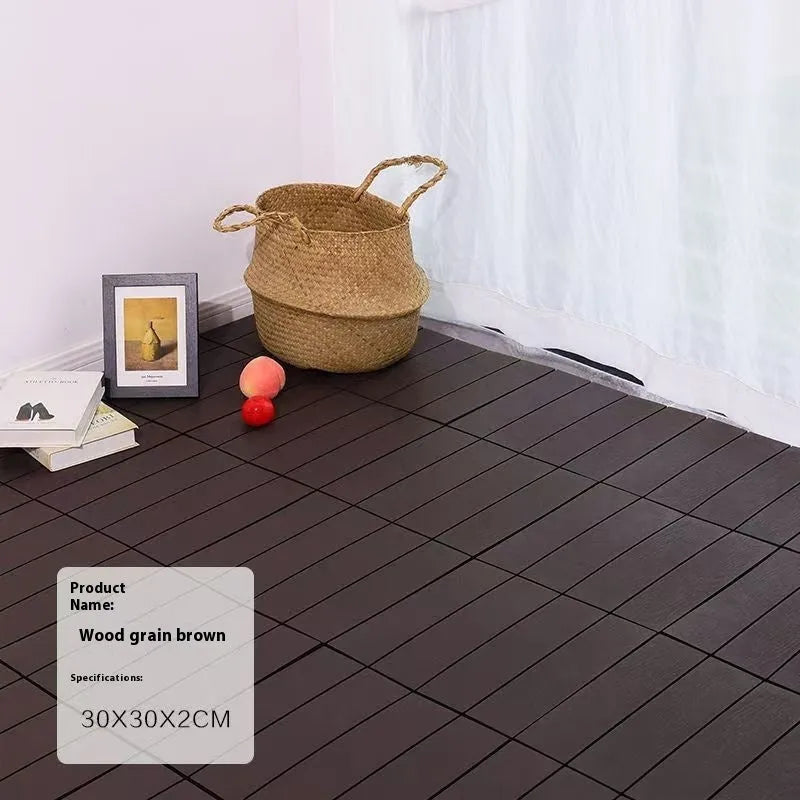 Wood grain plastic floor tiles showing splicing design and non-slip surface texture