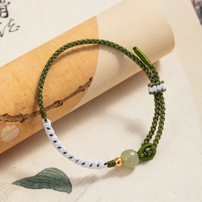 Hetian jade sterling silver Chinese national bracelet with colourful cord carrying strap