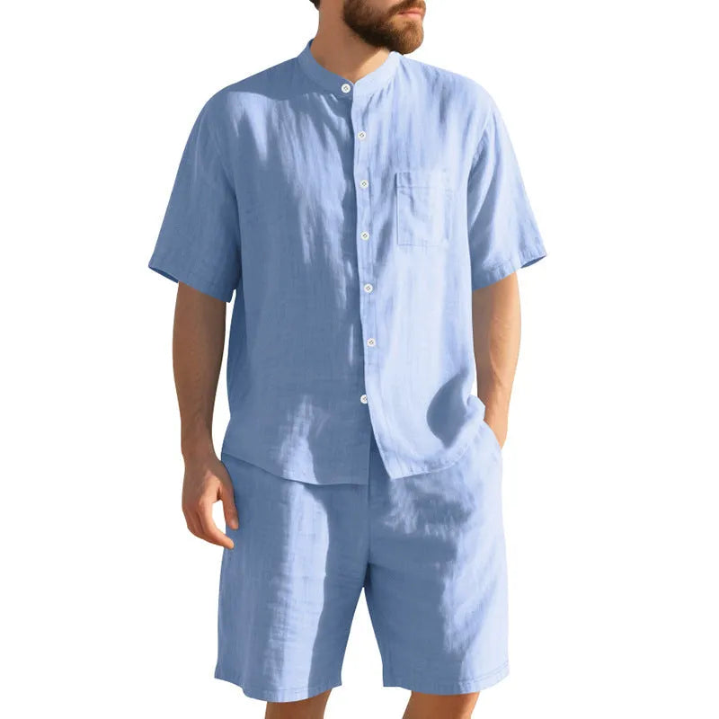 Men's light blue short sleeve linen shirt and shorts two-piece casual suit set on a hanger.
