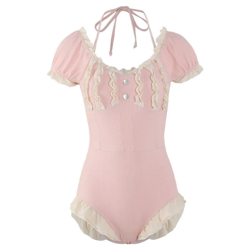 Pink women's conservative one-piece swimsuit with Siamese-inspired cute design
