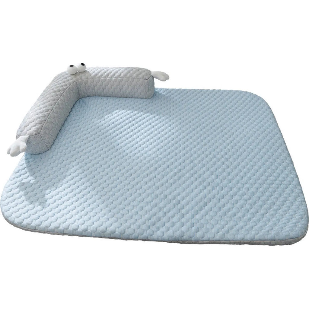 Blue big-eyed monster design pet bed cushion showing non-slip base and raised sofa style construction