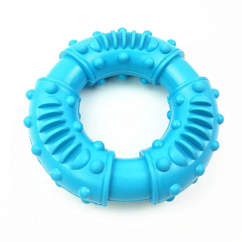 Lightweight hollow dog fetching stick toy in blue, orange, or red, showing bendy plastic construction for safe chewing and fetch games.