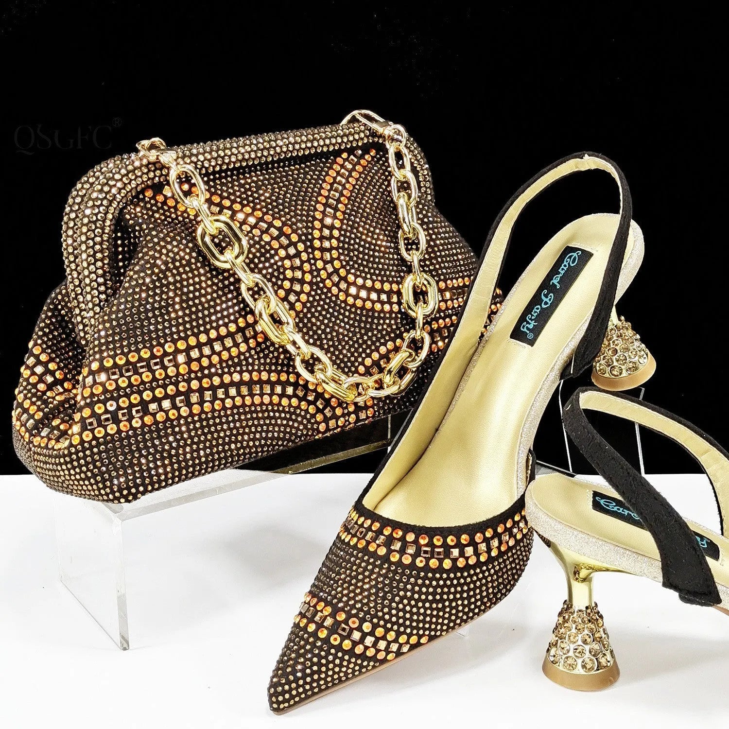 Women's pointed toe high heel shoes with rhinestone decoration and matching small bag in synthetic leather