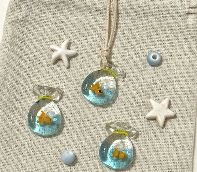 Women's necklace with coloured glaze joker skirt pendant on a cotton linen clavicle chain