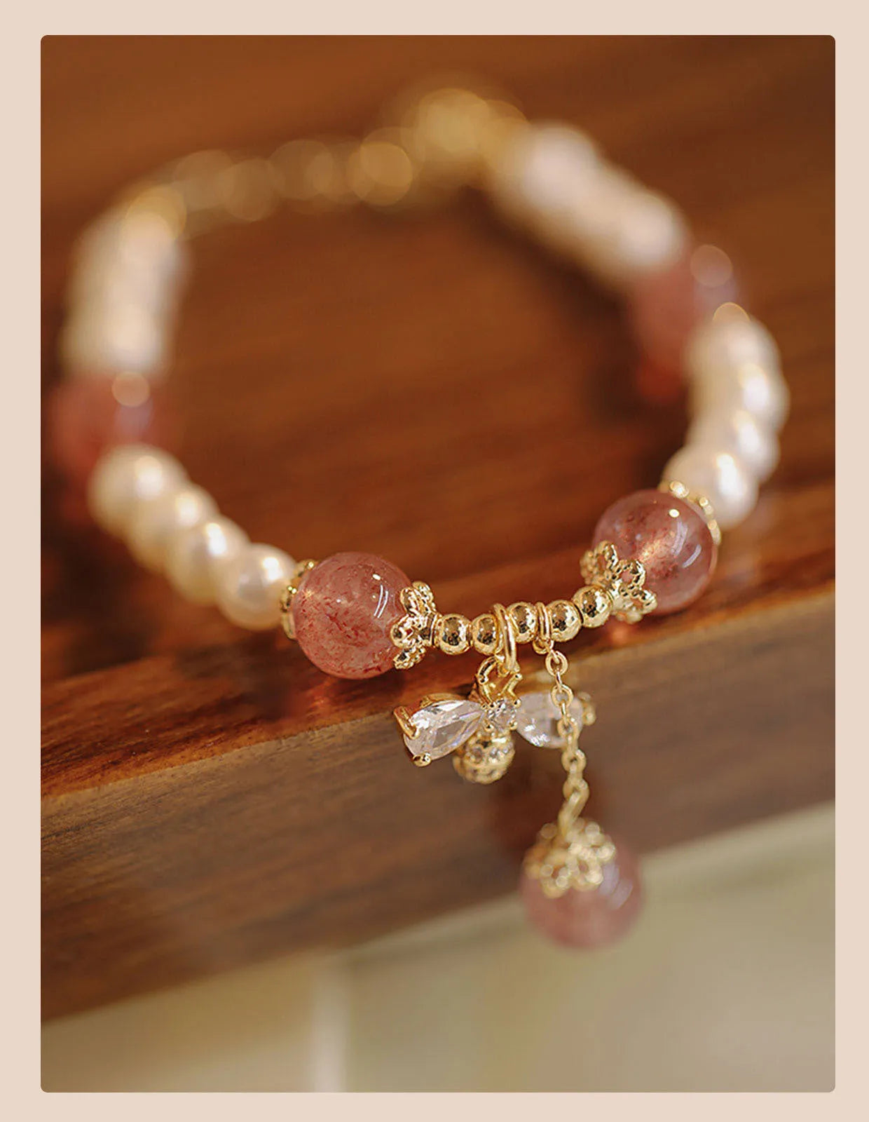 Strawberry quartz crystal bracelet with stringed pearls and bow charm in INS style