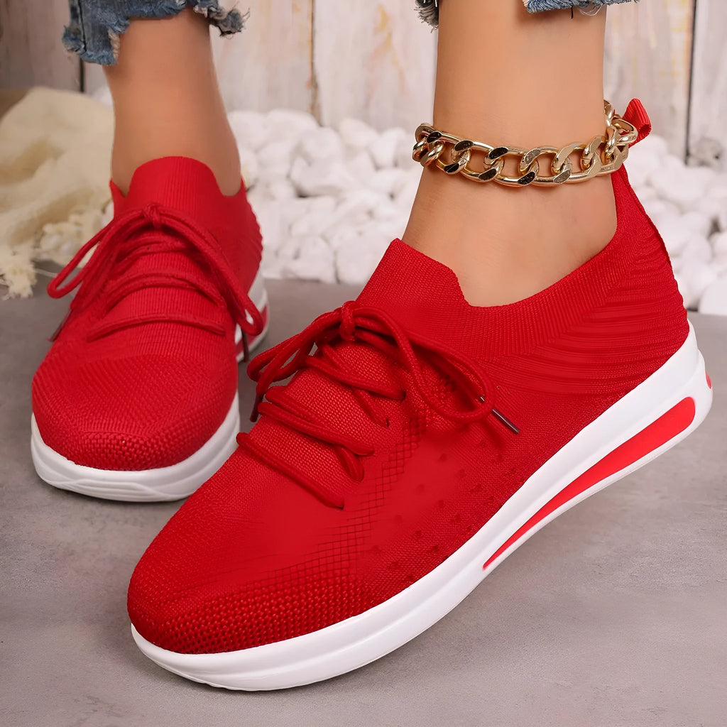Women's low-top casual sneakers in black, blue, or red with round toe and lace-up front