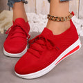 Women's low-top casual sneakers in black, blue, or red with round toe and lace-up front