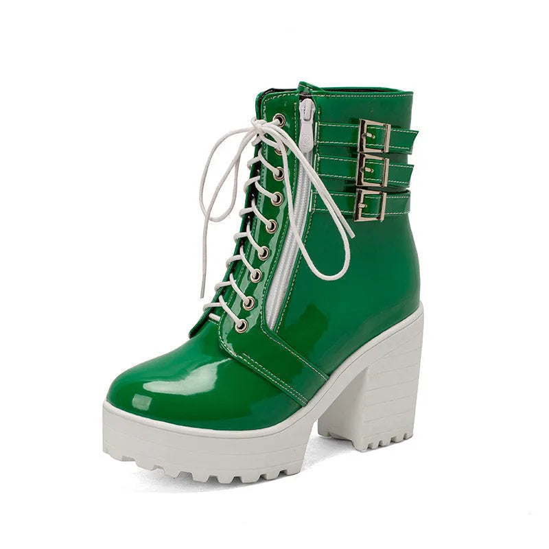 Women's black thick-heeled short boots with lace-up front and round toe on a waterproof platform.