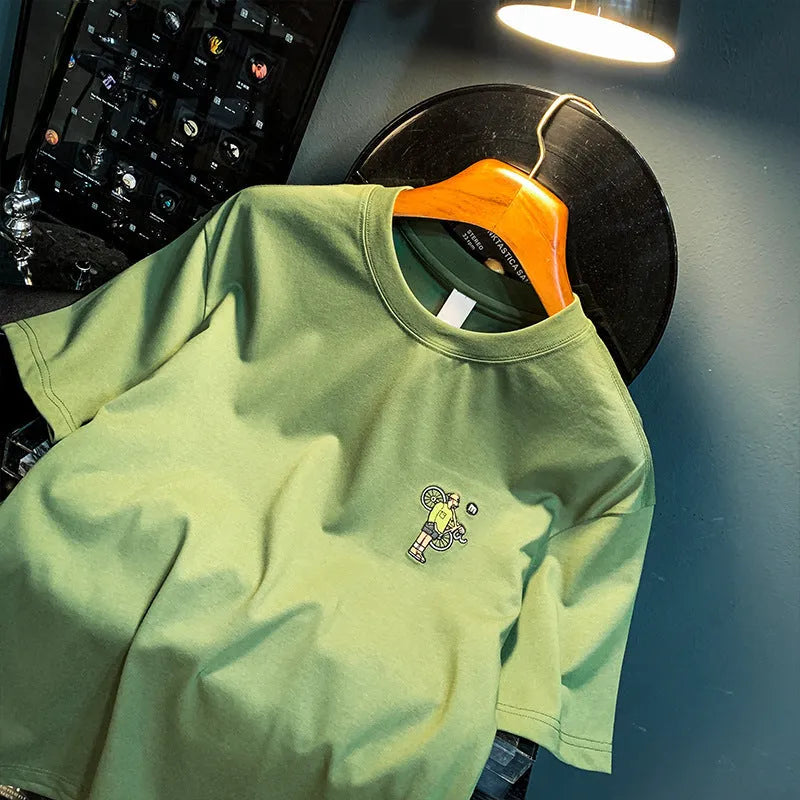 Men's green loose fit short sleeve t-shirt with trendy Literary Youth style print.
