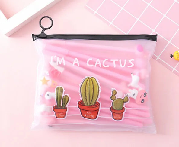 Set of 20 black 0.5mm ballpoint pens with cartoon cactus designs in plastic storage case measuring 21cm by 17cm