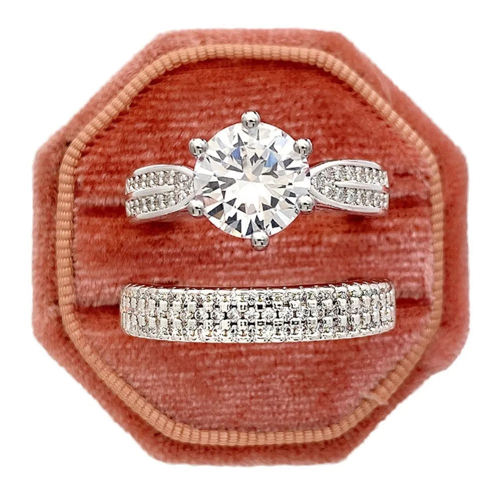 White gold colour wedding ring attached to matching bracelet with geometric shapes and round decorative elements