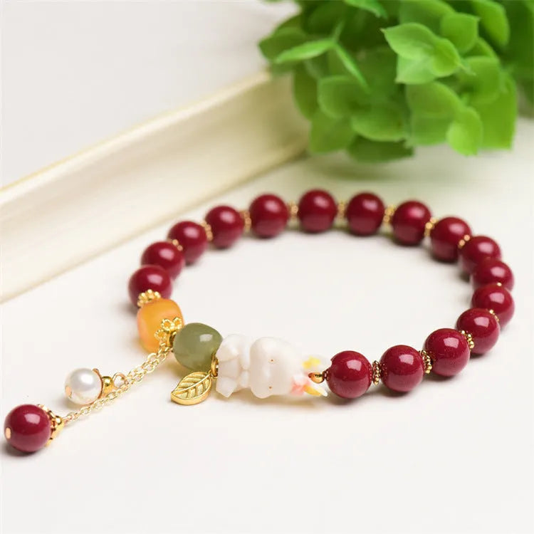 Natural cinnabar rabbit bracelet for women in national style, shown in 8mm and 10mm size options.