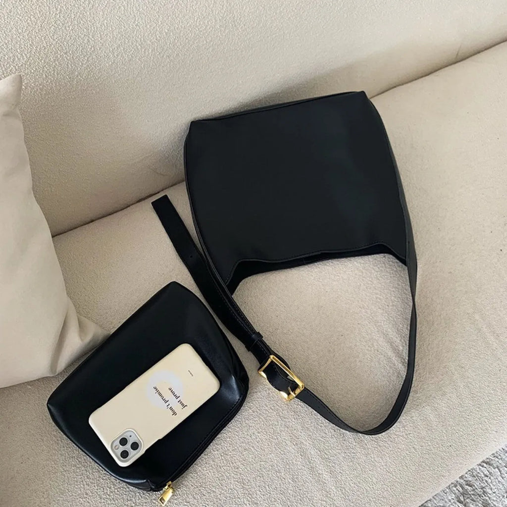 Women's soft PU shoulder bag with swing threads in black or brown colour options