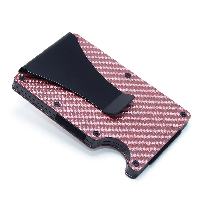 Geometric carbon fibre and aluminium slim card holder wallet in multiple colour options on a table.